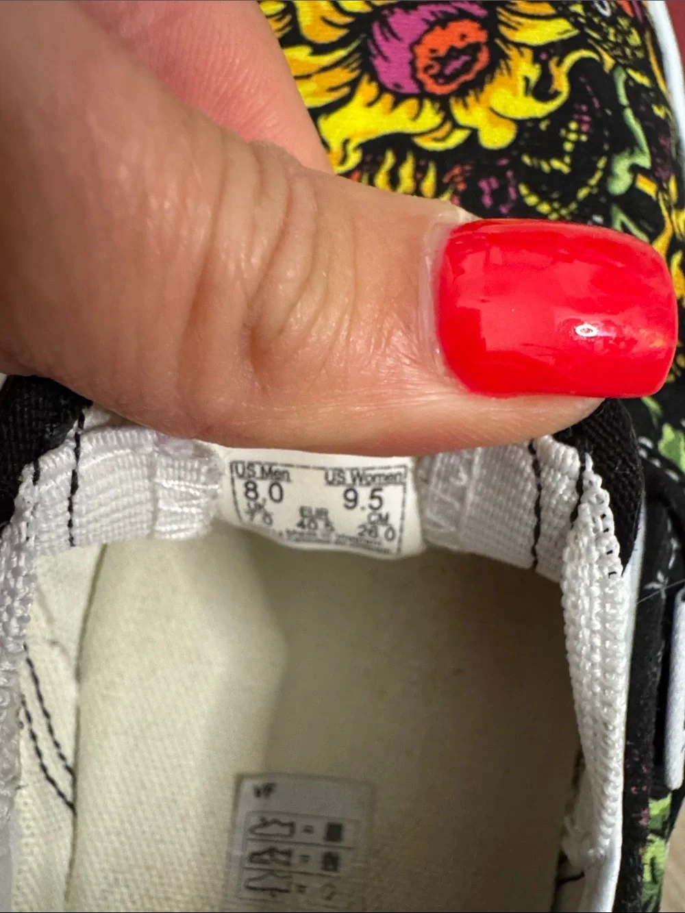 Vans Black Slip-On Loafers with Yellow Floral Skull Graphic